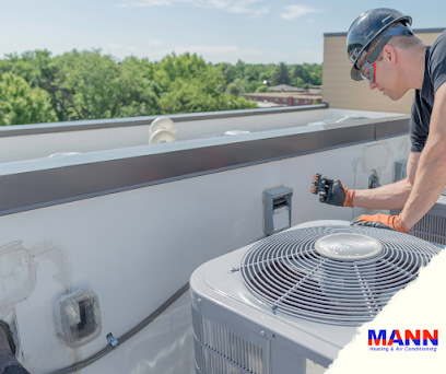 Negocio Mann's Heating And Air Conditioning Inc