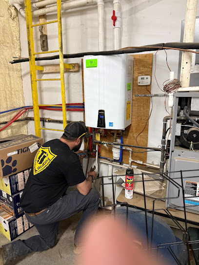 Negocio Tj's Plumbing & Heating Of Erie