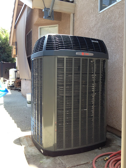 Negocio Town & Country Heating & Air Conditioning Inc.